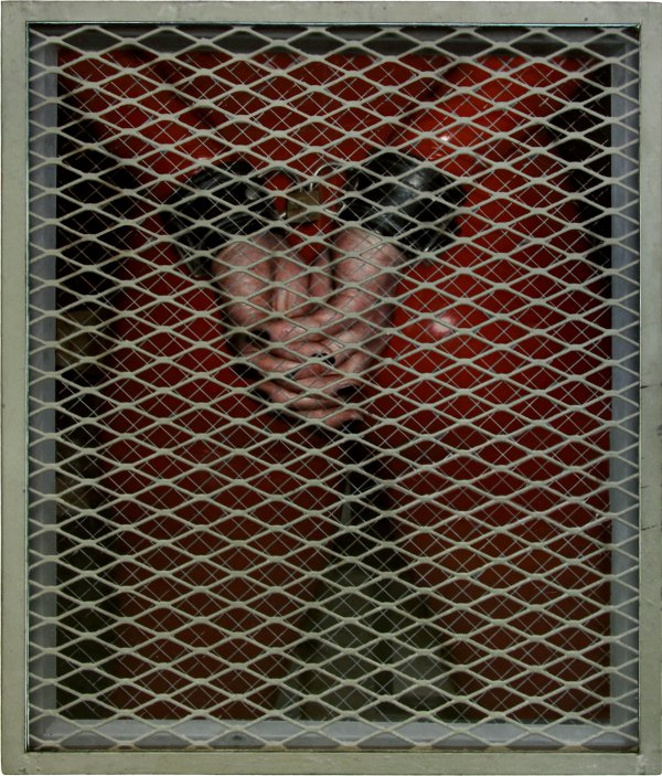 Red Rubber Suit With Handcuffs by Dan Witz