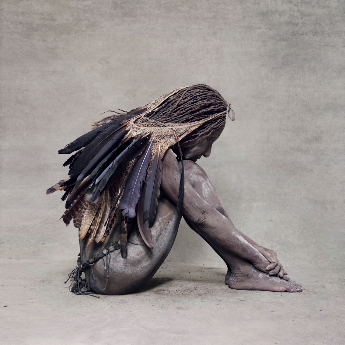 Woman With Feather Bag, New Guinea by Fred Stichnoth