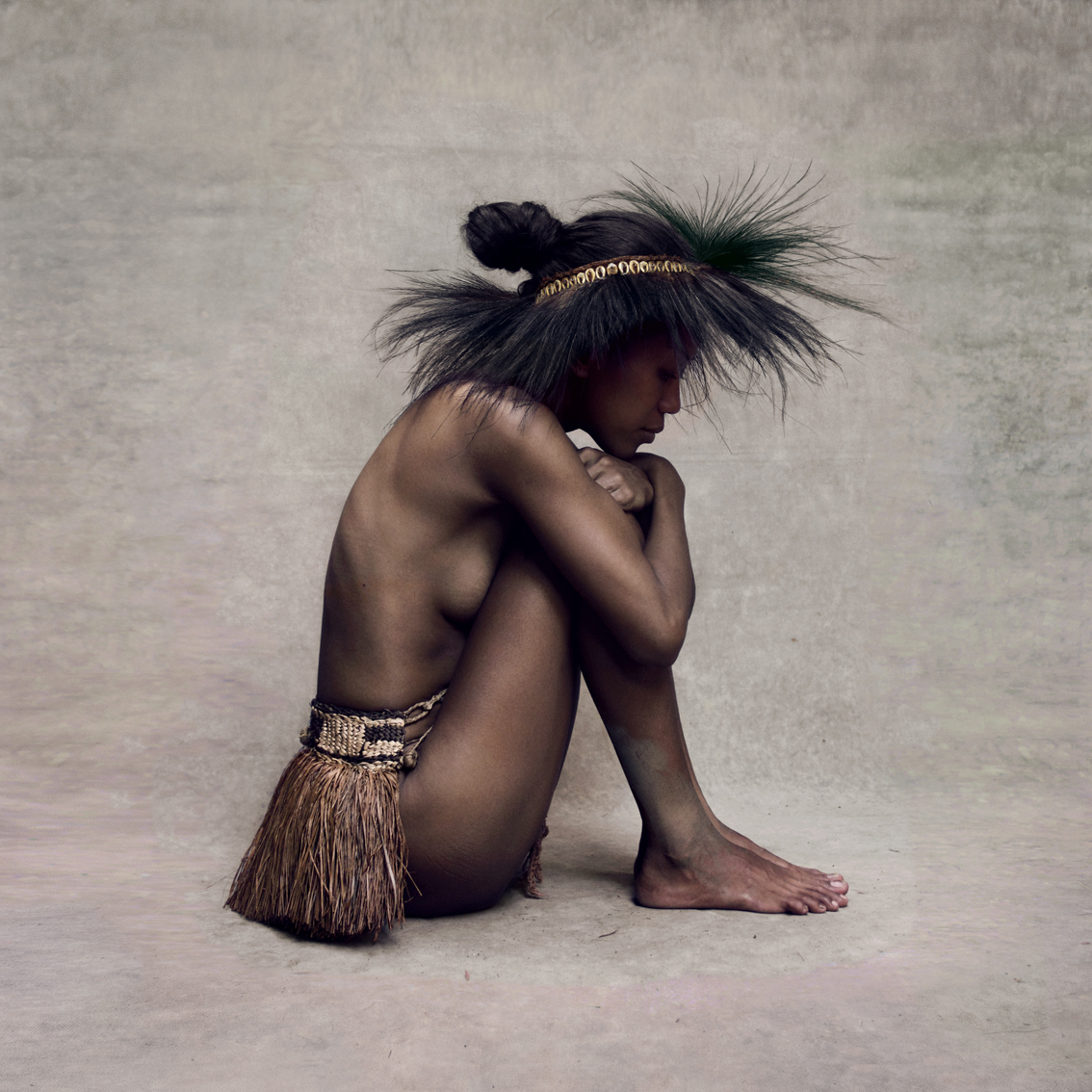 Young Woman With Paradise Bird Headpiece, New Guinea by Fred Stichnoth