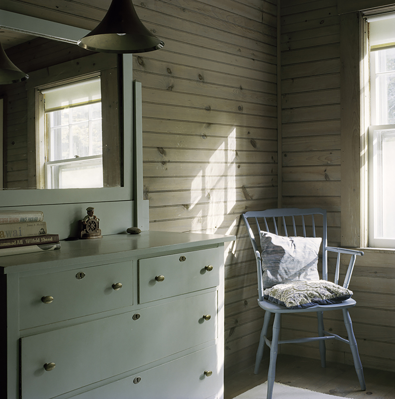 Master Bedroom With Blue Chair by Shellburne Thurber