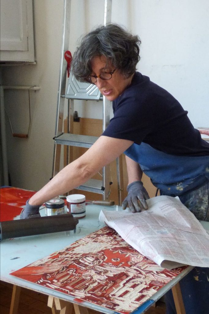 Pascale Hémery in her studio working on colour linocut ‘Madrid’ 