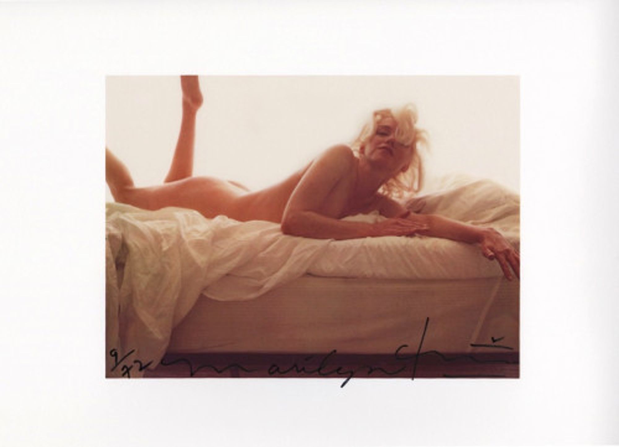 Marilyn colour nude on the bed by Bert Stern