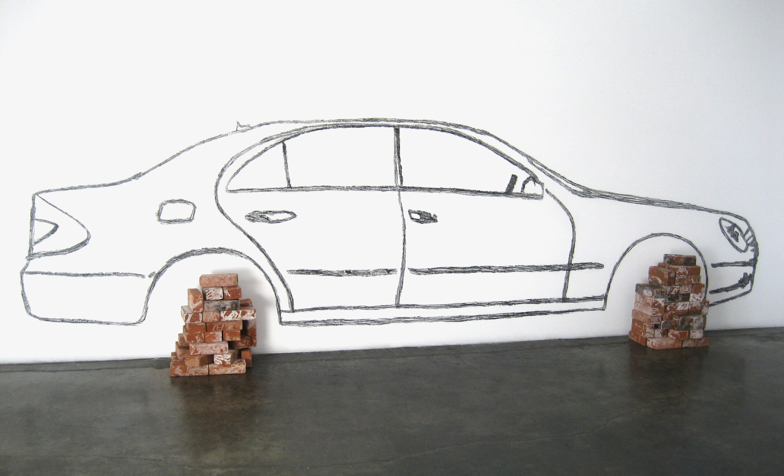 Car on Bricks by Robin Rhode