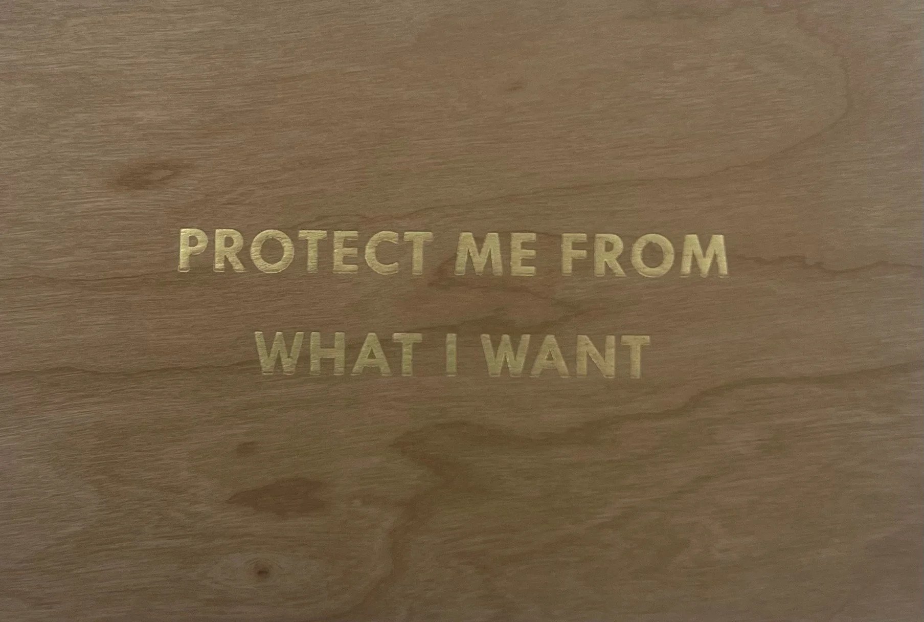 Protect Me From What I Want – Gold (Truism Series) by Jenny Holzer