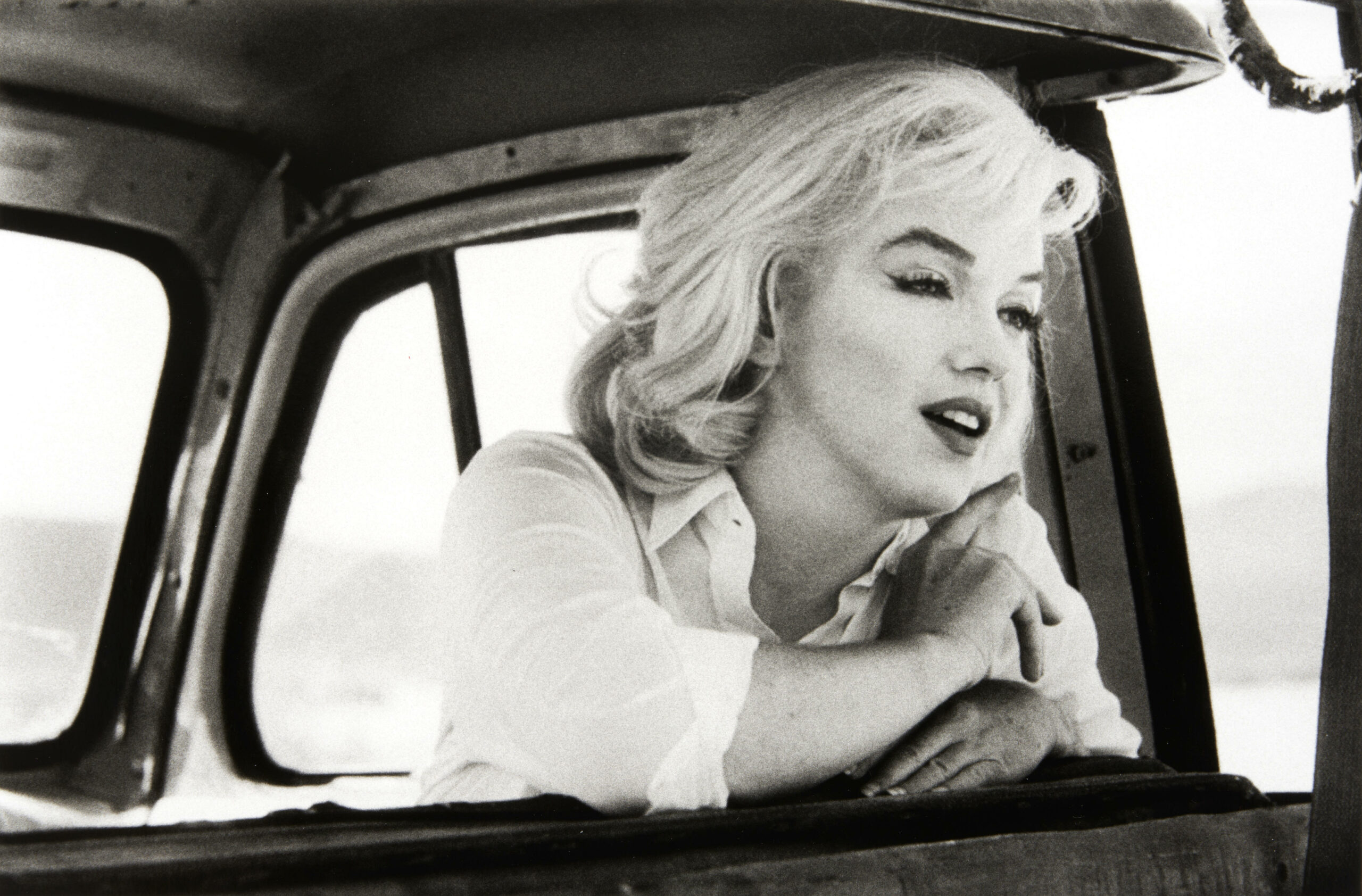 Marilyn Monroe in the Car Looking Forward by Ernst Haas