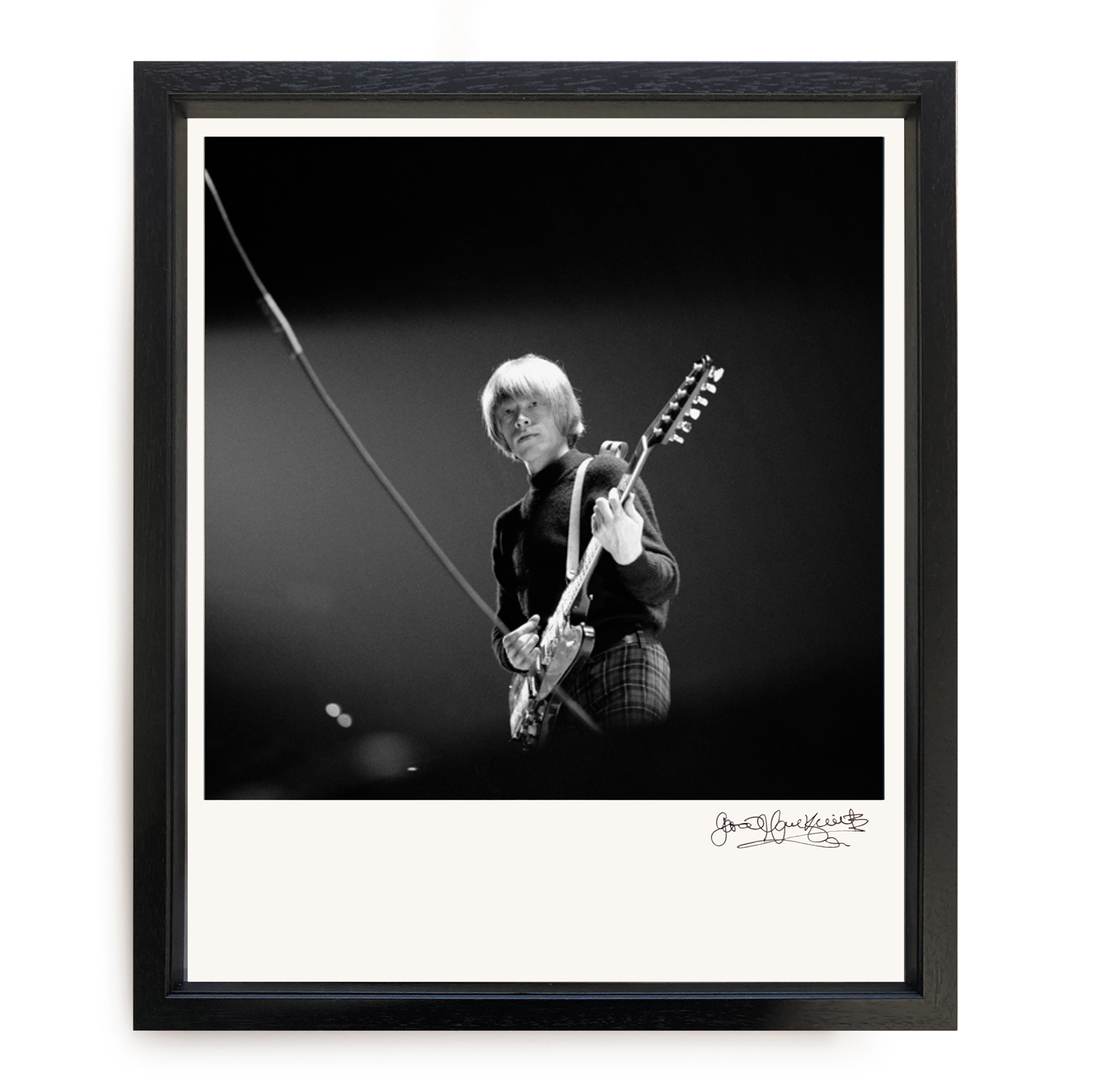 Brian Jones with Gibson Firebird VII by Gered Mankowitz