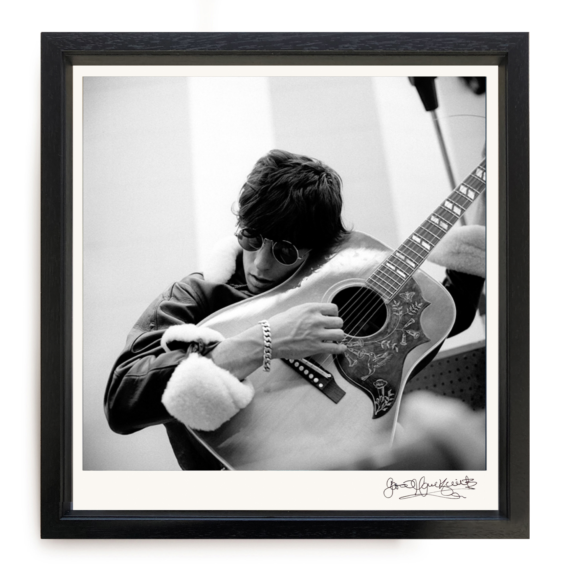 Keith Richards with Gibson Hummingbird by Gered Mankowitz